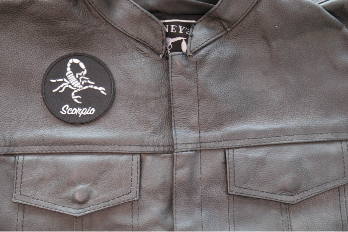 Scorpio Patch - Iron on - Embroidered shown on leather vest