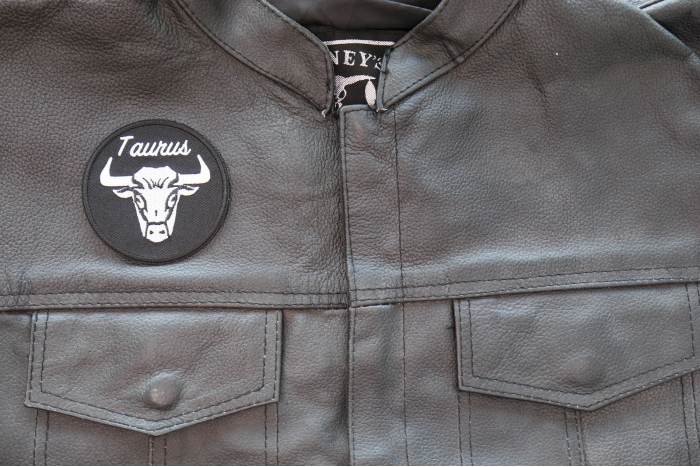 Taurus Patch - Iron on - Embroidered shown on leather vest
